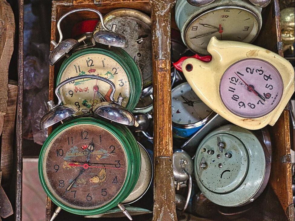 Bin full of old clocks